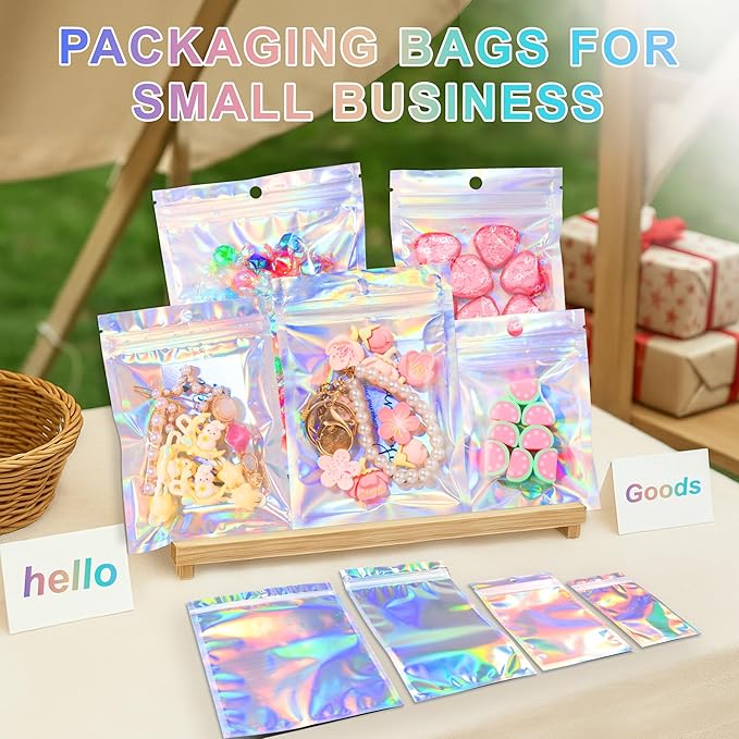 ANZNKU 100 Pack Mylar Bags Reasealable Holographic Bags, Smell Proof Bag Zipper Pouches with Clear Window, Jewelry Candy Sealable Bag for Packaging Sample Party Favor (4.7 x 7.9 Inch)